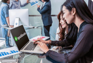 Accounting firm team working on QuickBooks