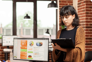 Small business owner reviewing finances